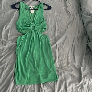 Brand new green mini dress with ring and cut out